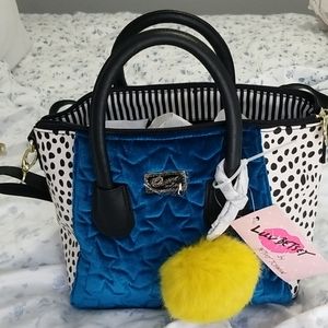 Turquoise and polka dot handbag